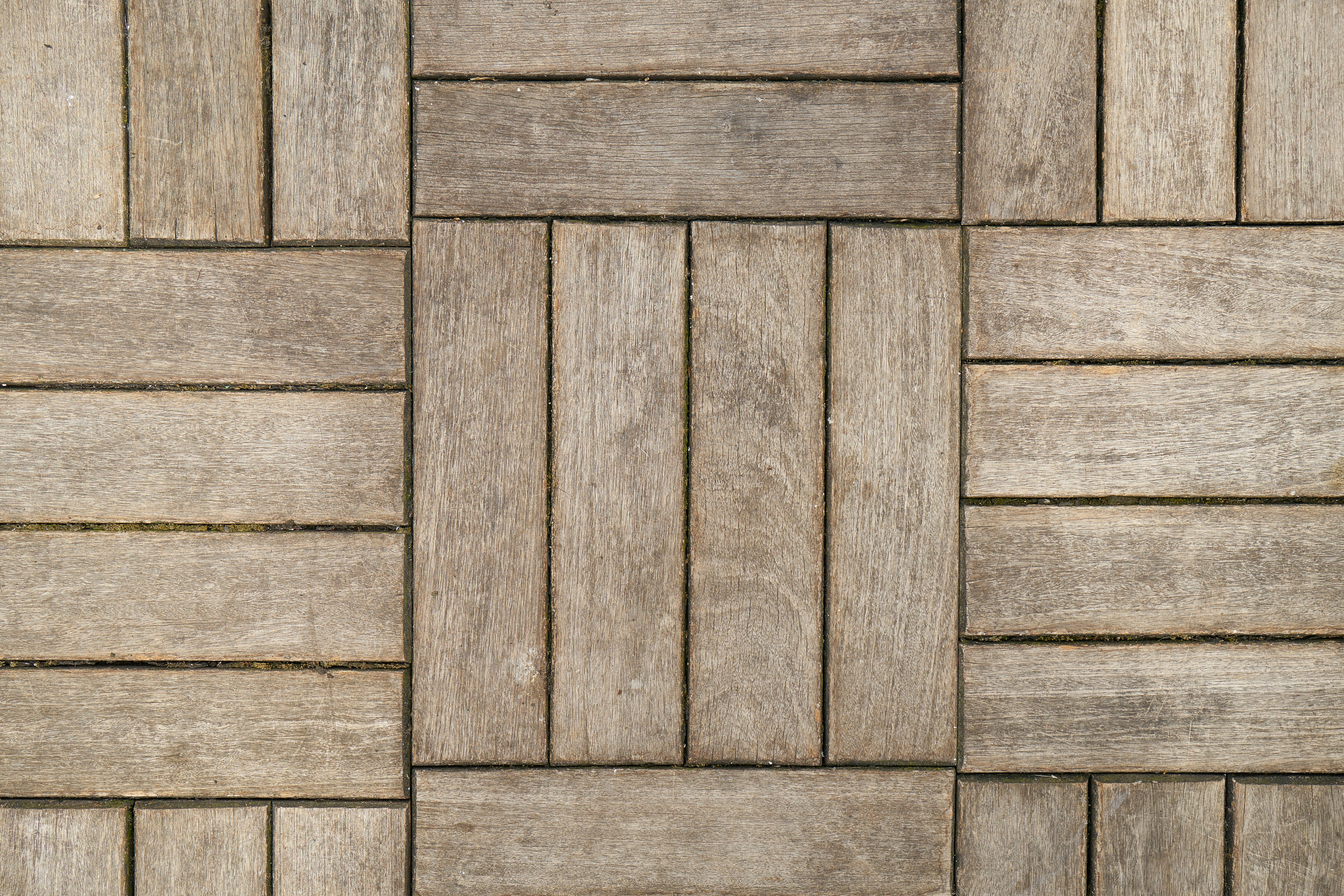 gray scale photo of wooden surface